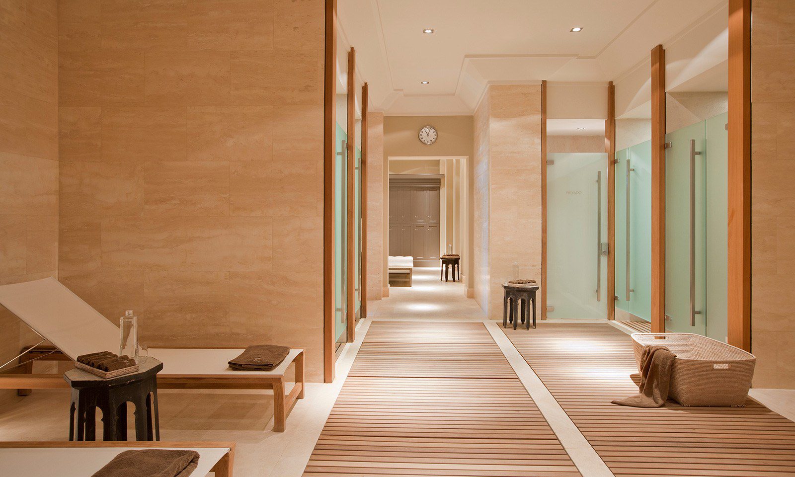 The changing rooms at the luxury hotel spa with frosted glass doors