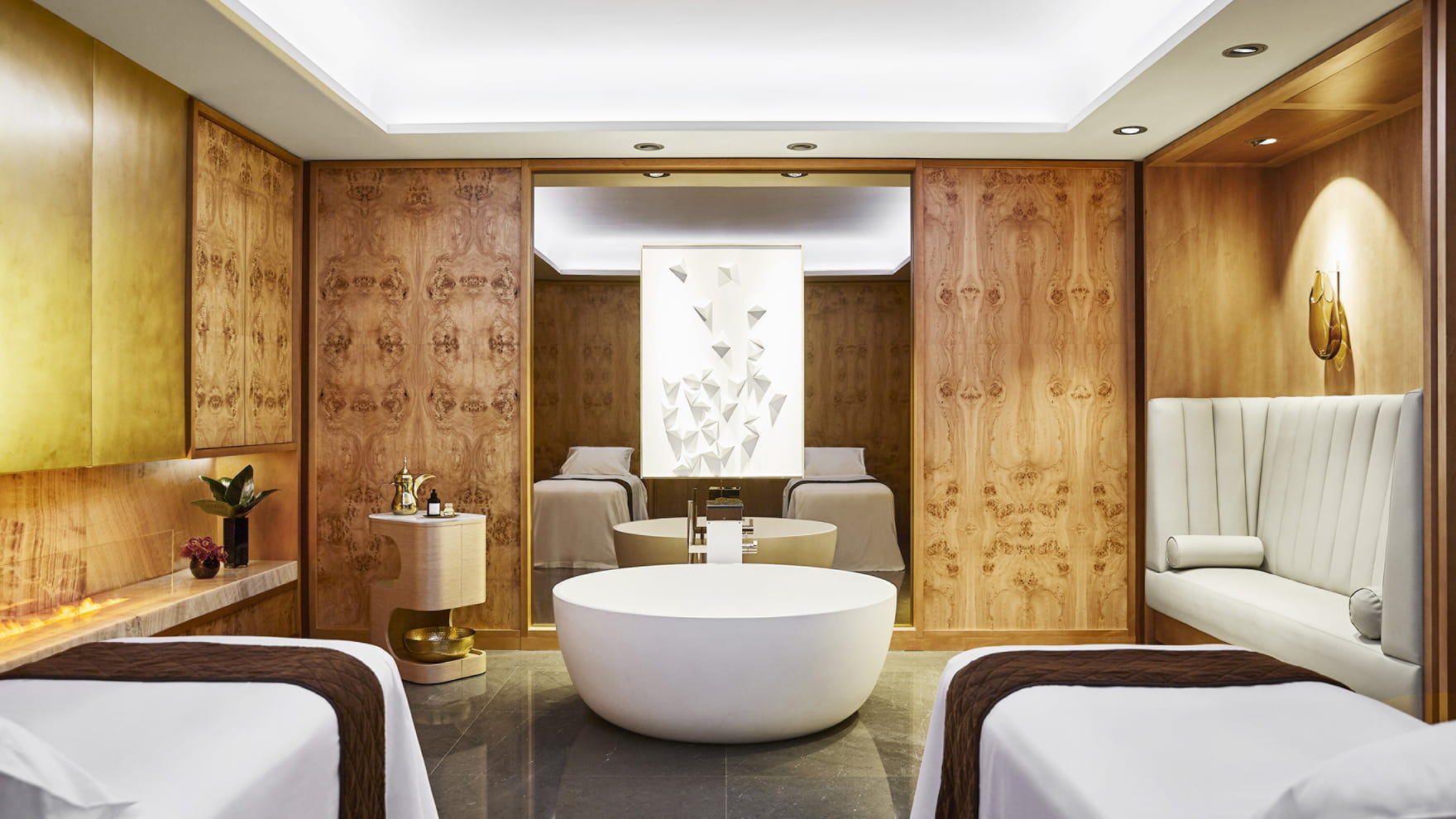 Luxury Spa image showing 2 massage tables at Treatment room at the Spa at the Four Seasons Hotel in Madrid Spain