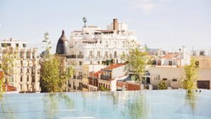 View from the infinity pool at the Thompson Hotel over Madrid skyline.