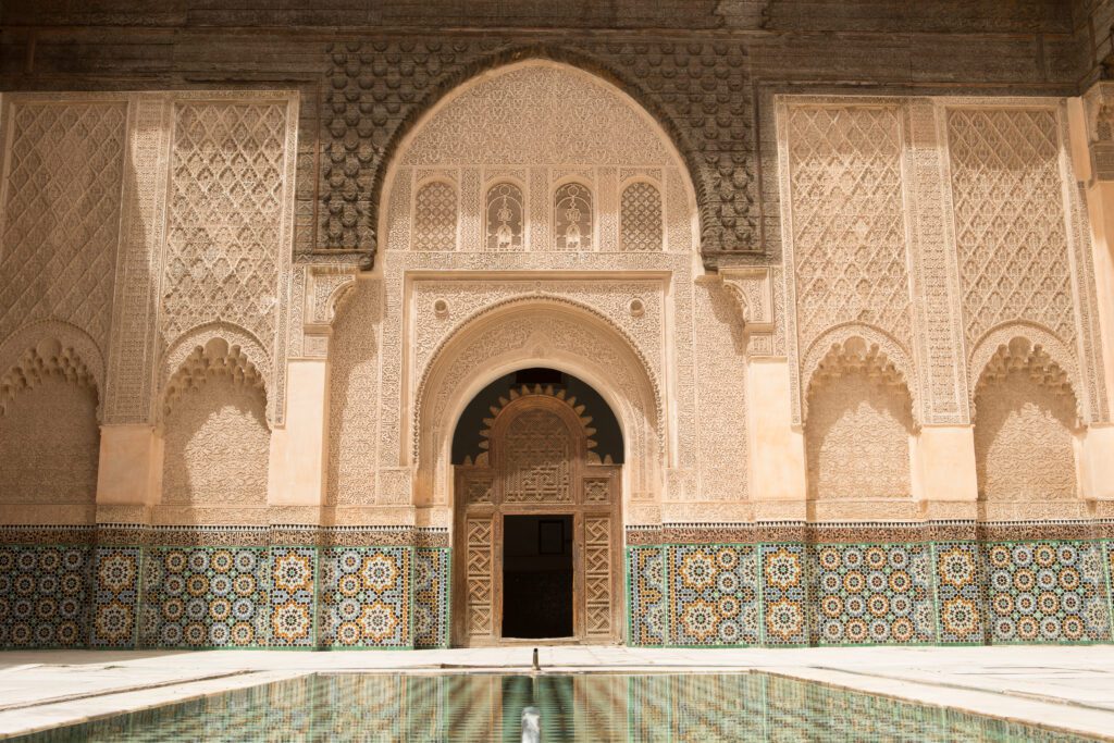 Courtyard with pool at entrnace to Ben Youssef Medrassa in Marrakech