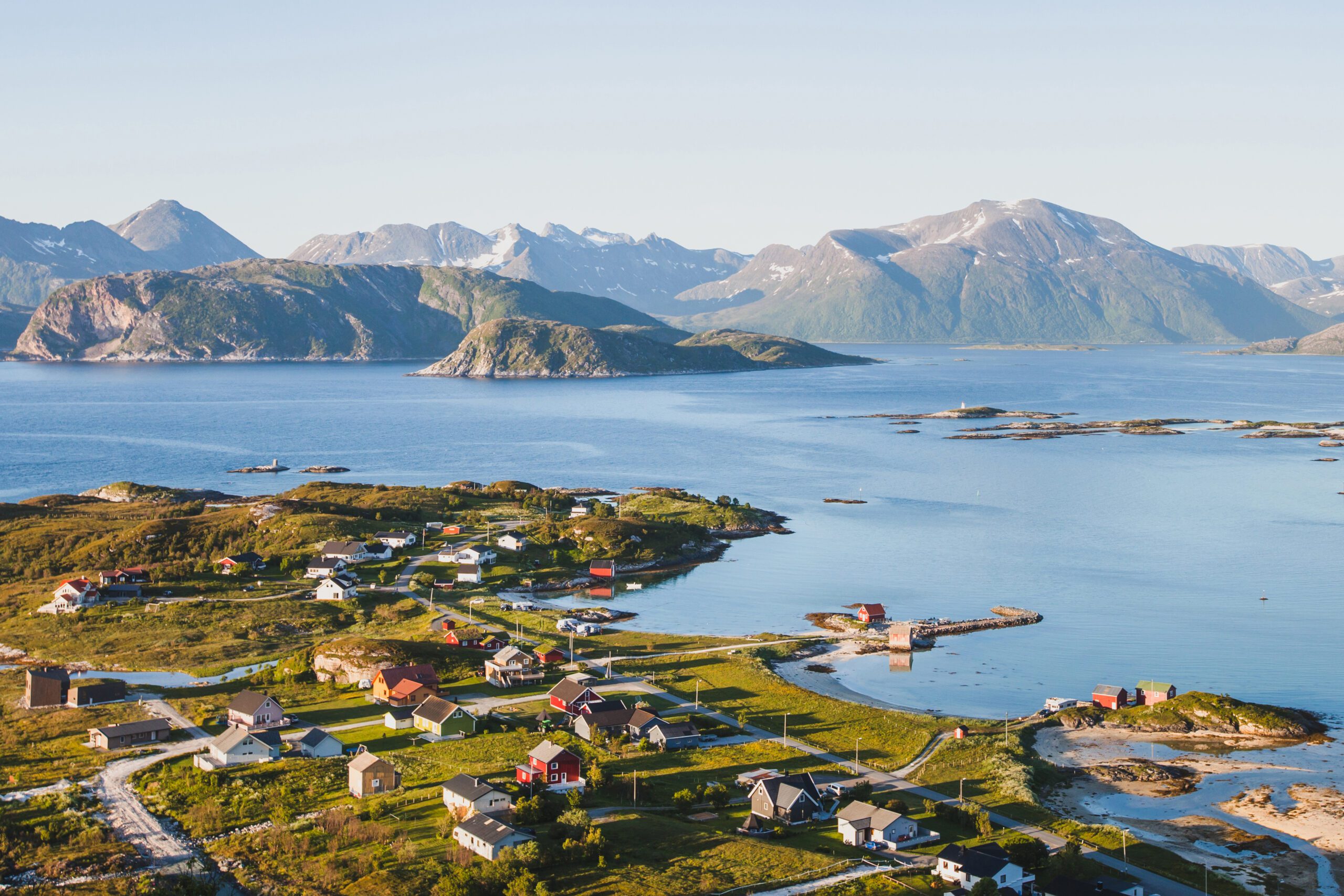 Beautiful fisherman village in Norway, stunning aerial panoramic landscape showing the fjords and mountains