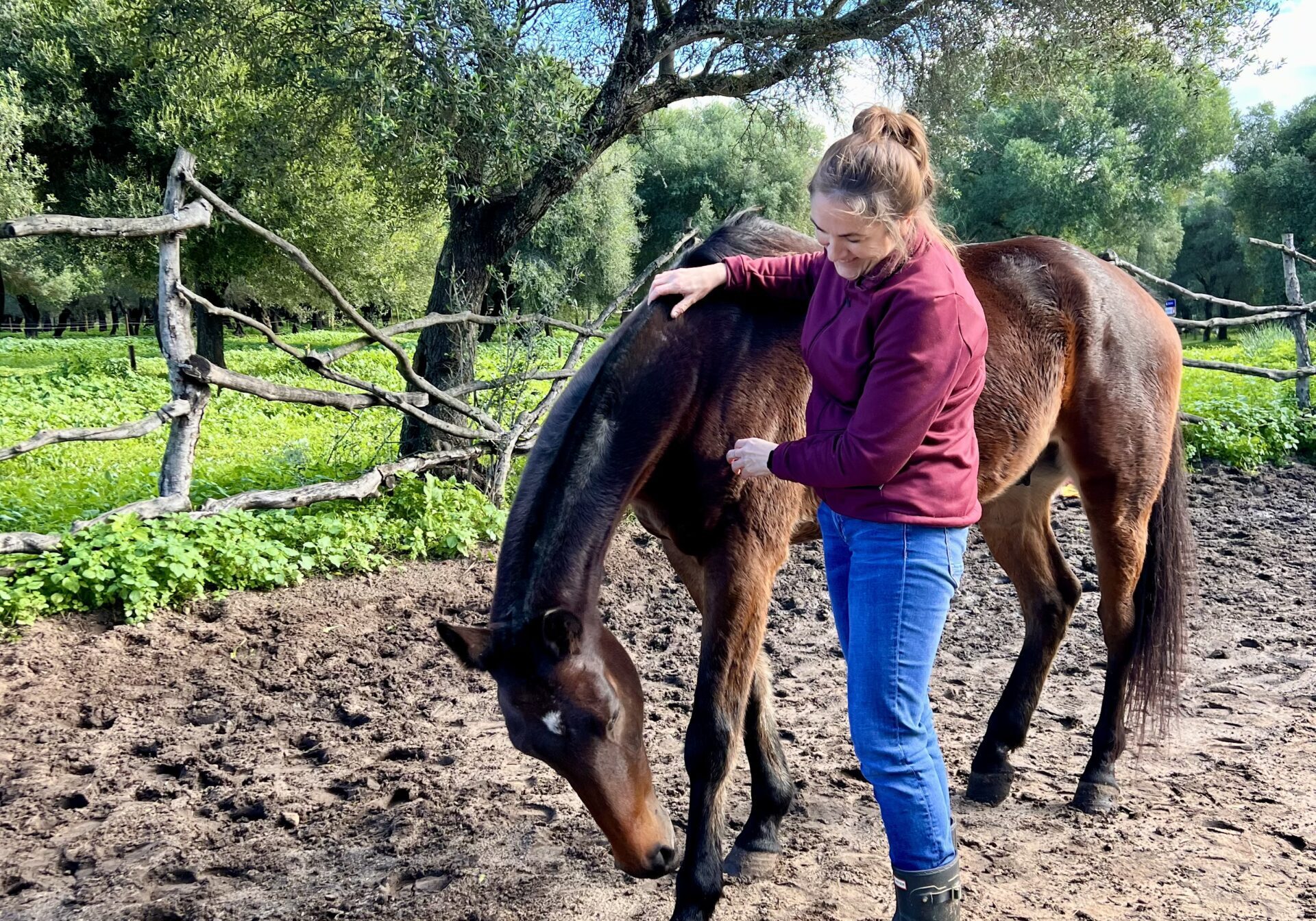 Clare Westwood Owner of Travel with Abeona with a horse during the Arion Coaching Session