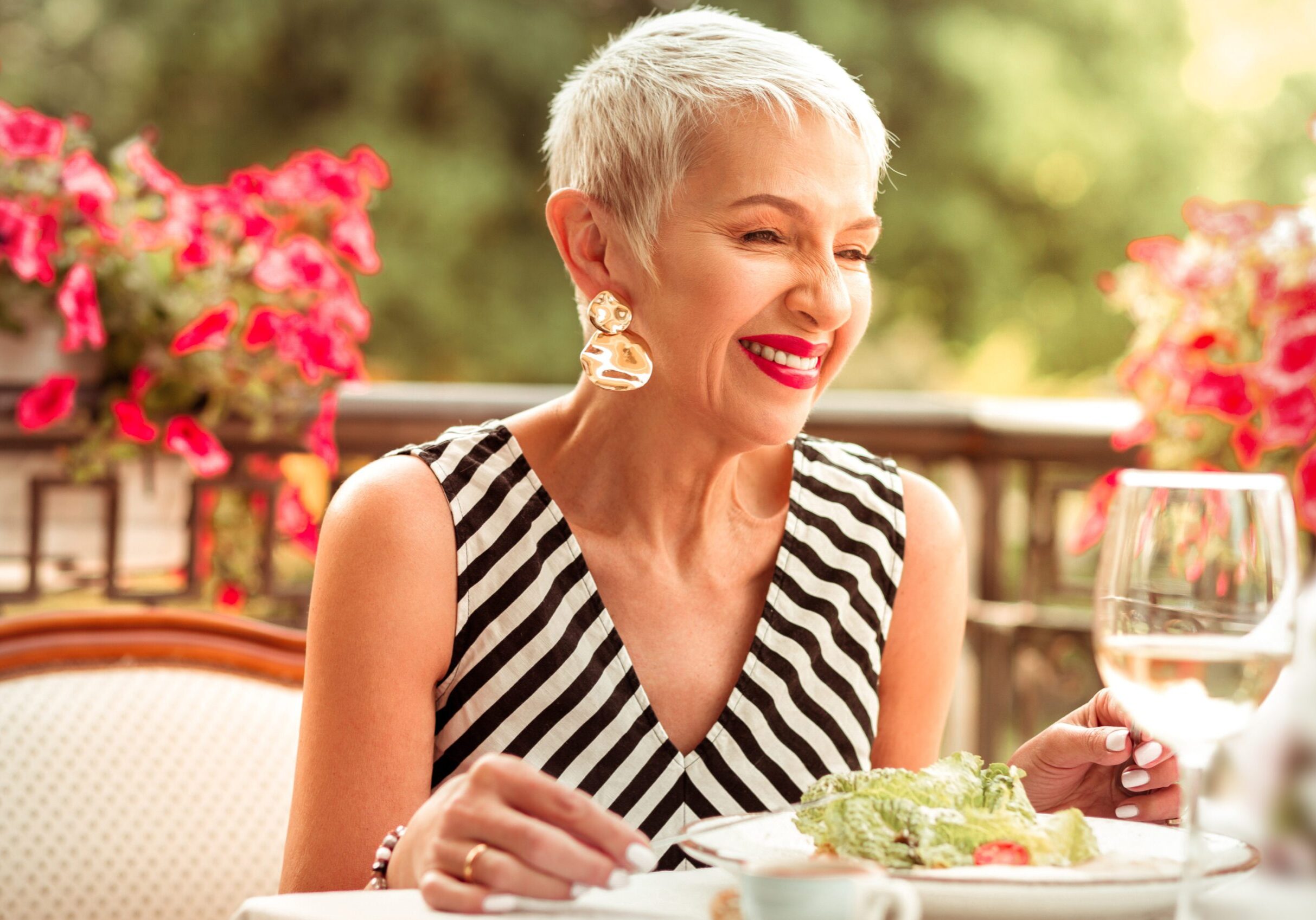 Woman dining alone as a solo female traveller.